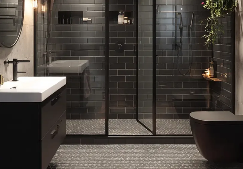 Modern black bathroom with metro tiles, black fixtures and fittings, walk-in shower with glass screen and contemporary vanity unit